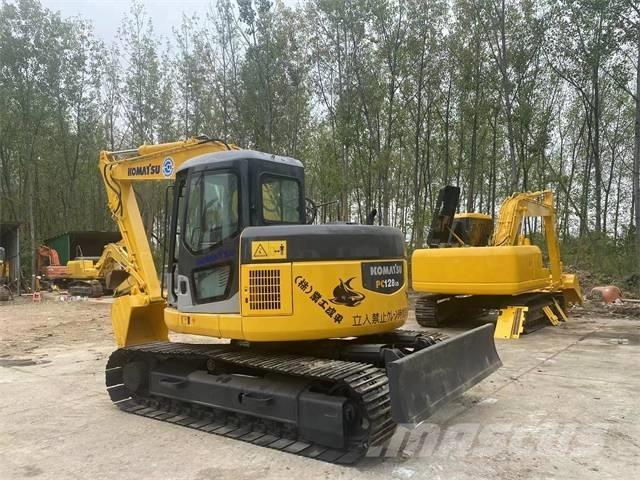 Komatsu PC128US Гусеничные экскаваторы
