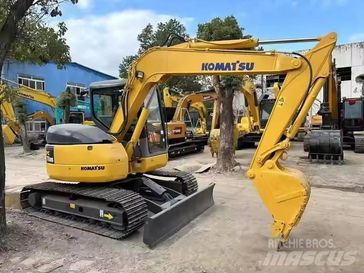 Komatsu PC78US Гусеничные экскаваторы