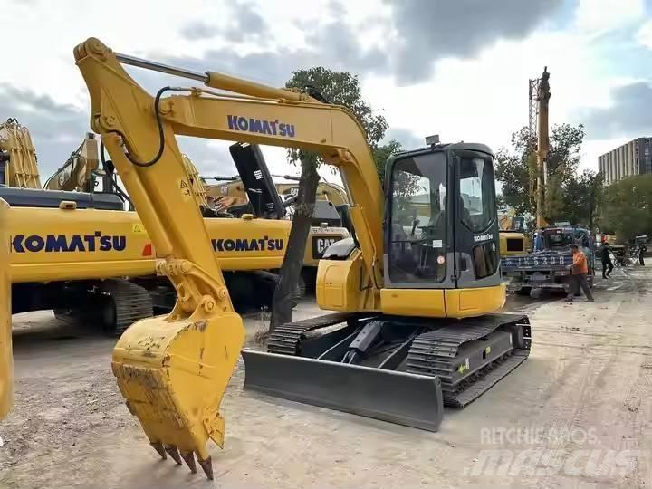 Komatsu PC78US Гусеничные экскаваторы
