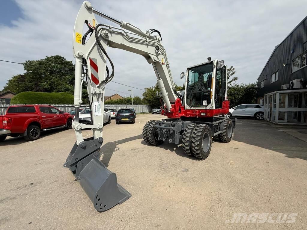 Takeuchi TB 295 W Колёсные экскаваторы