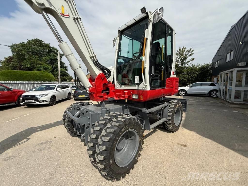Takeuchi TB 295 W Колёсные экскаваторы