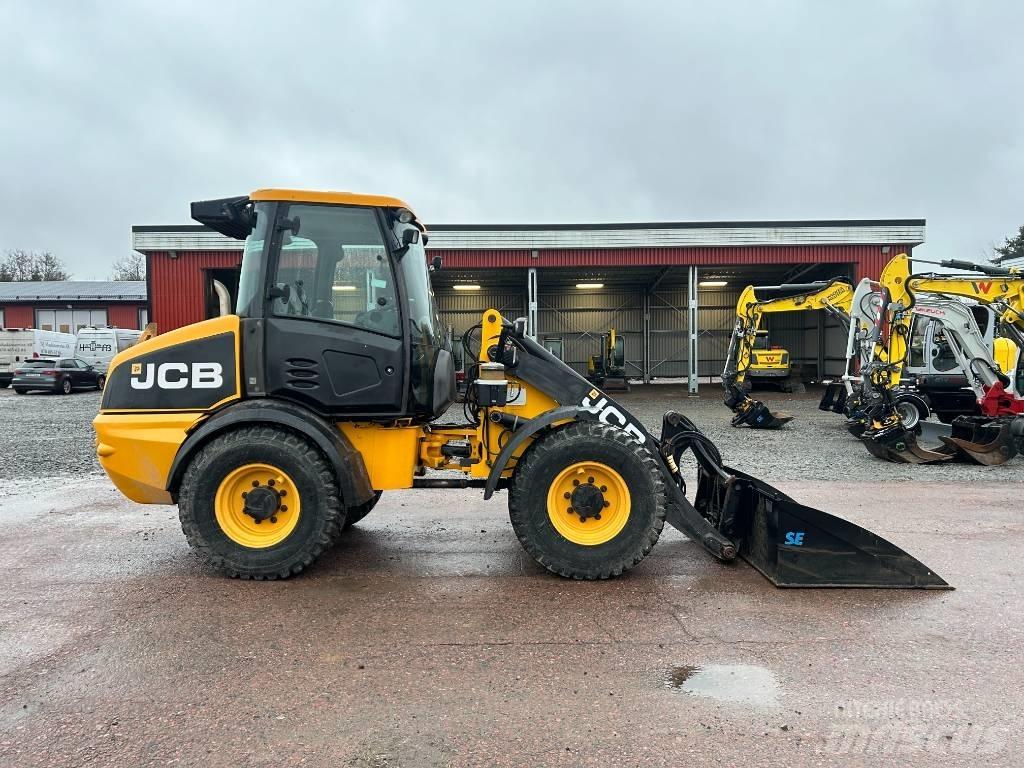 JCB 409 Фронтальные погрузчики