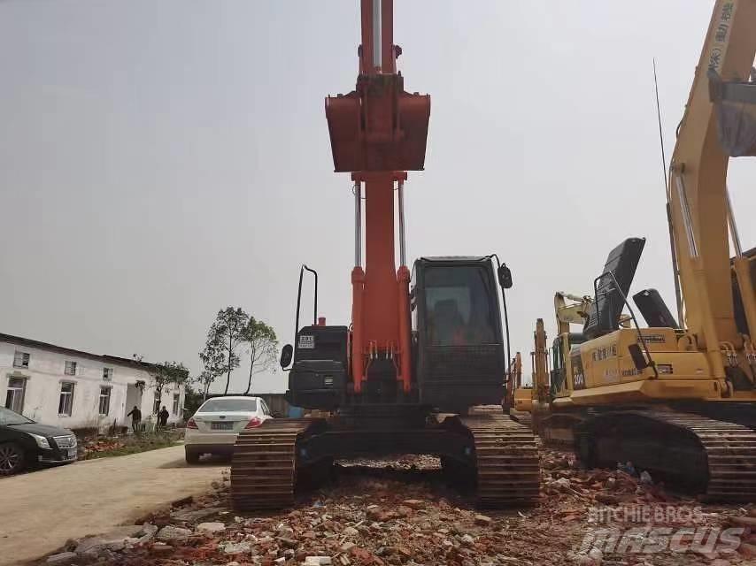 Hitachi ZX 210 Гусеничные экскаваторы