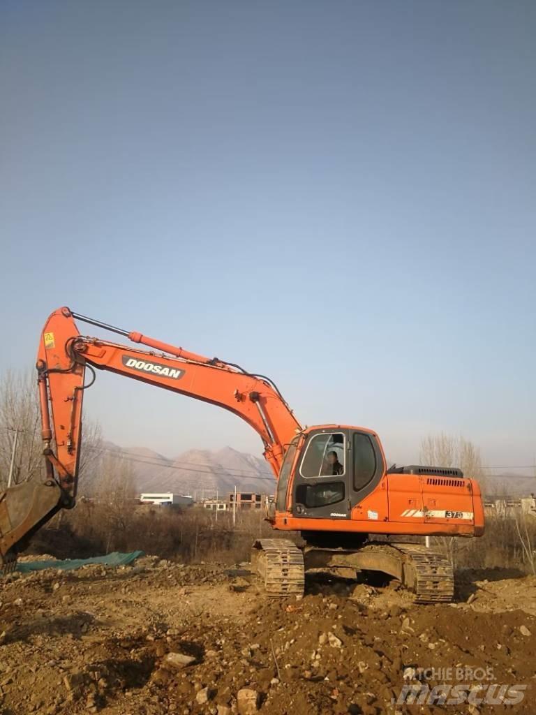 Doosan DX 225 Гусеничные экскаваторы