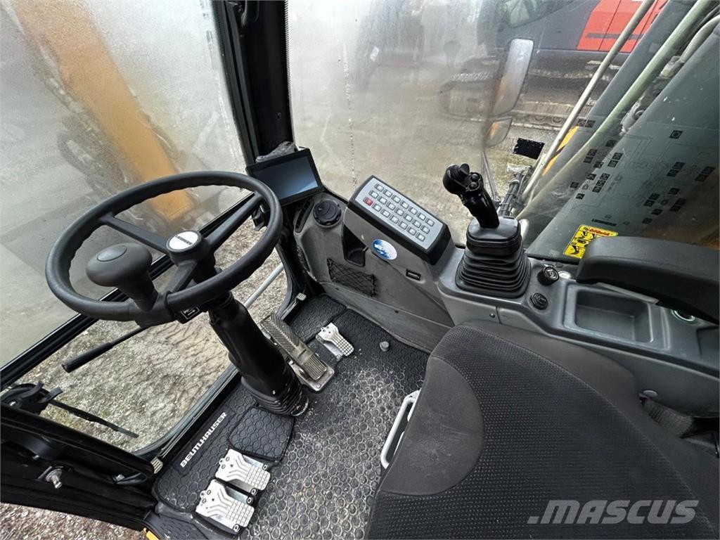 Liebherr A920 Колёсные экскаваторы