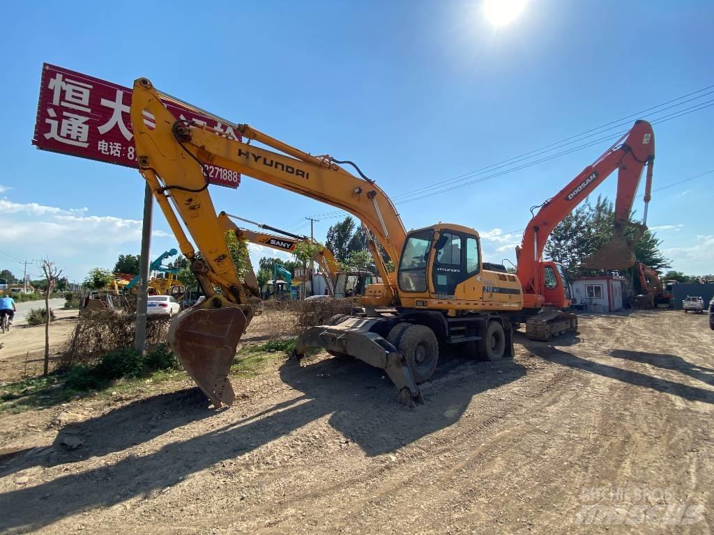 Hyundai 210w Колёсные экскаваторы
