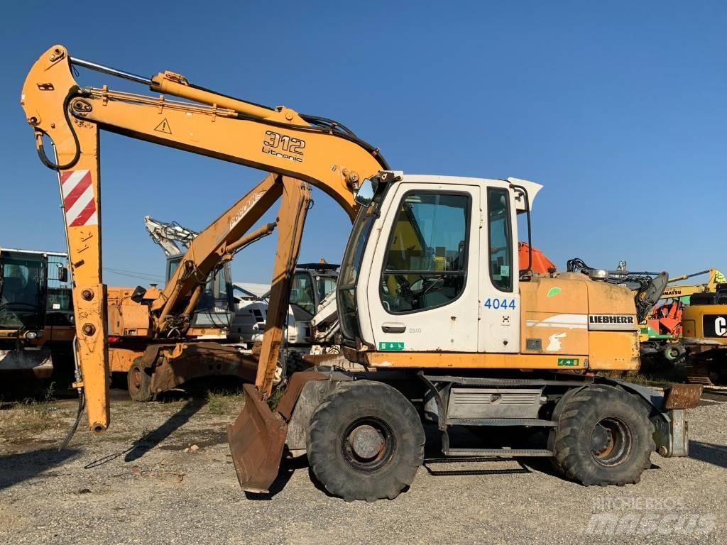 Liebherr A 312 Колёсные экскаваторы