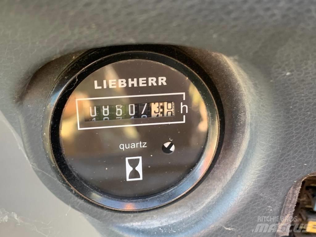 Liebherr A 312 Колёсные экскаваторы