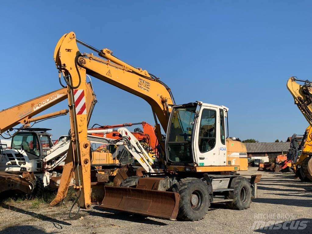 Liebherr A 312 Колёсные экскаваторы