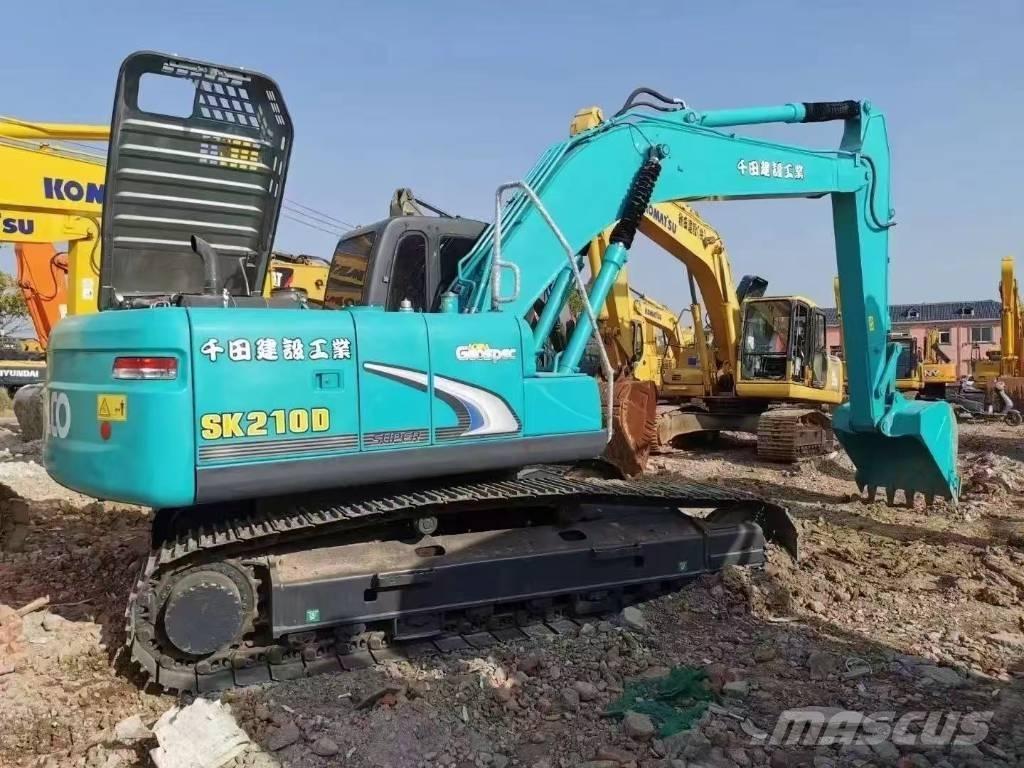 Kobelco 210 Гусеничные экскаваторы