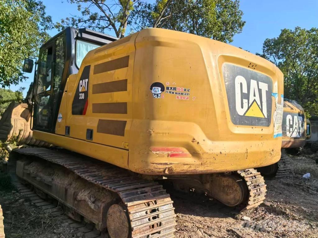 CAT 323 Гусеничные экскаваторы