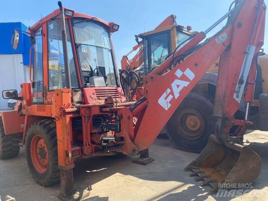Fai KOMATSU 595s Экскаваторы-погрузчики