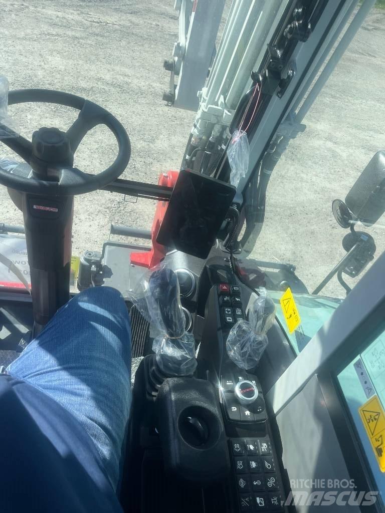 Takeuchi TB 370 W Колёсные экскаваторы