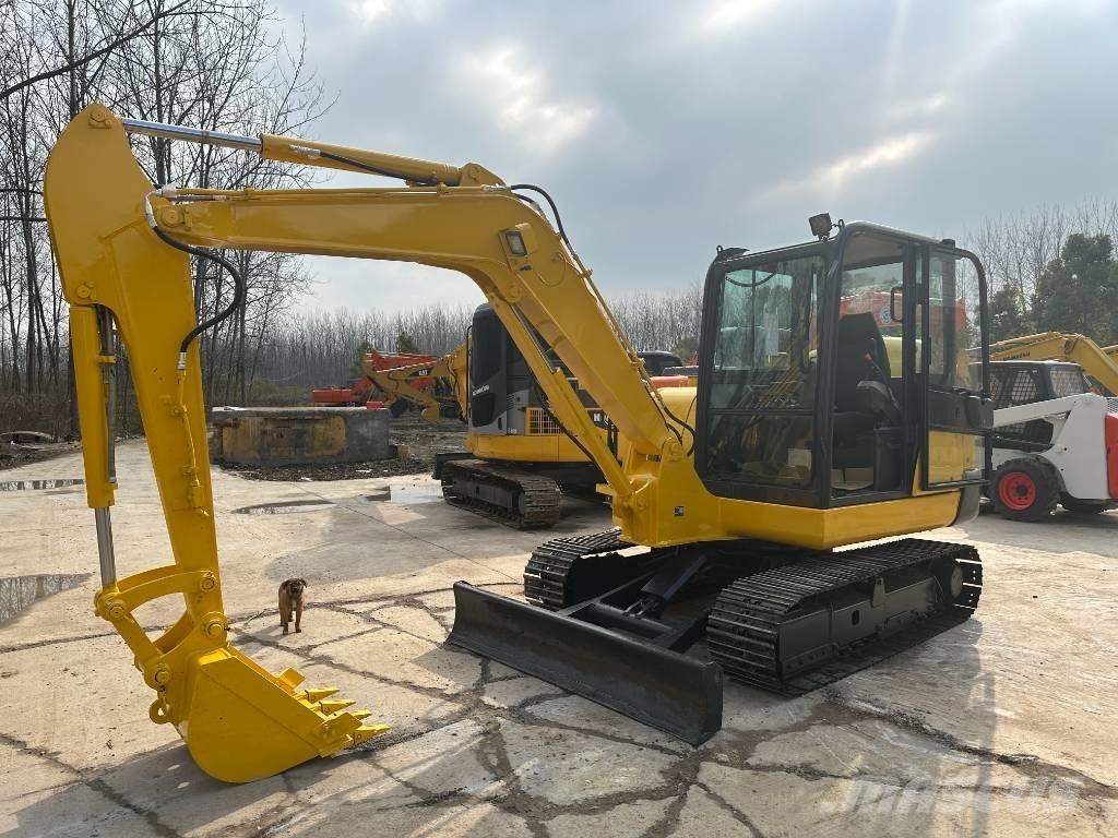 Komatsu PC56-7 Гусеничные экскаваторы
