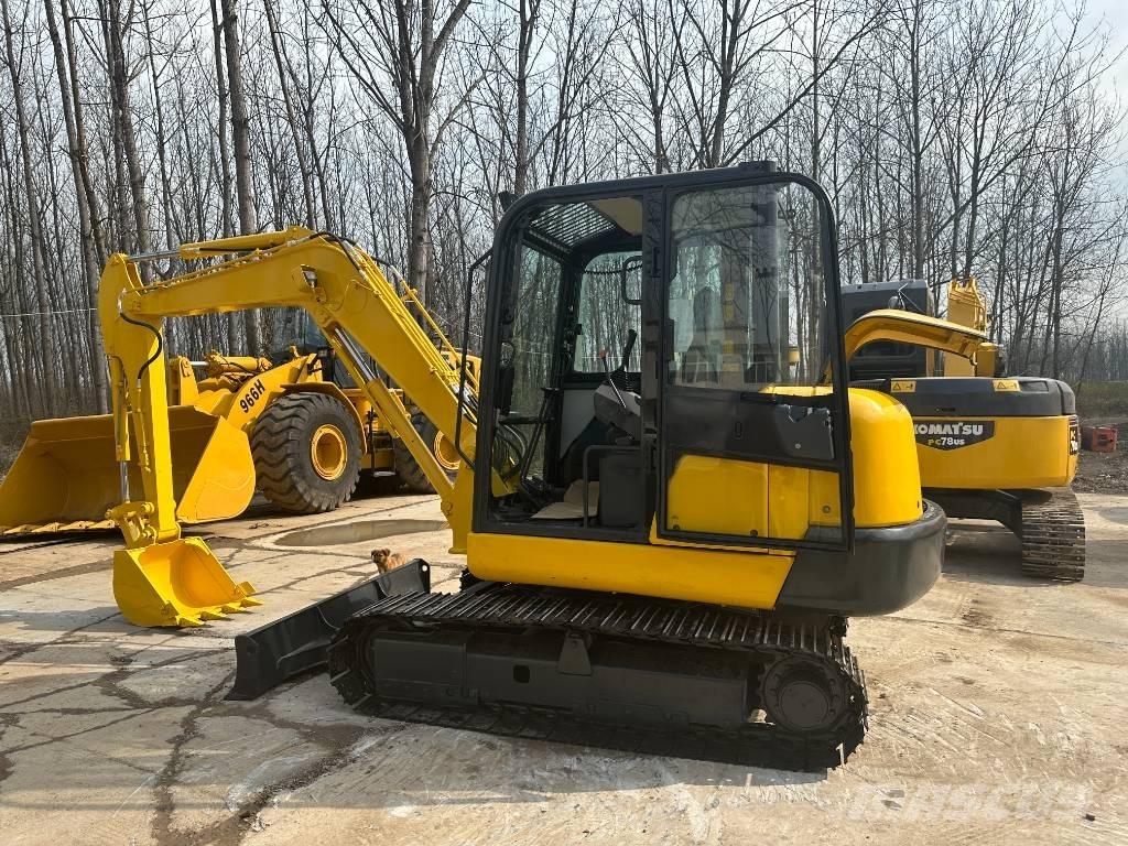 Komatsu PC56-7 Гусеничные экскаваторы