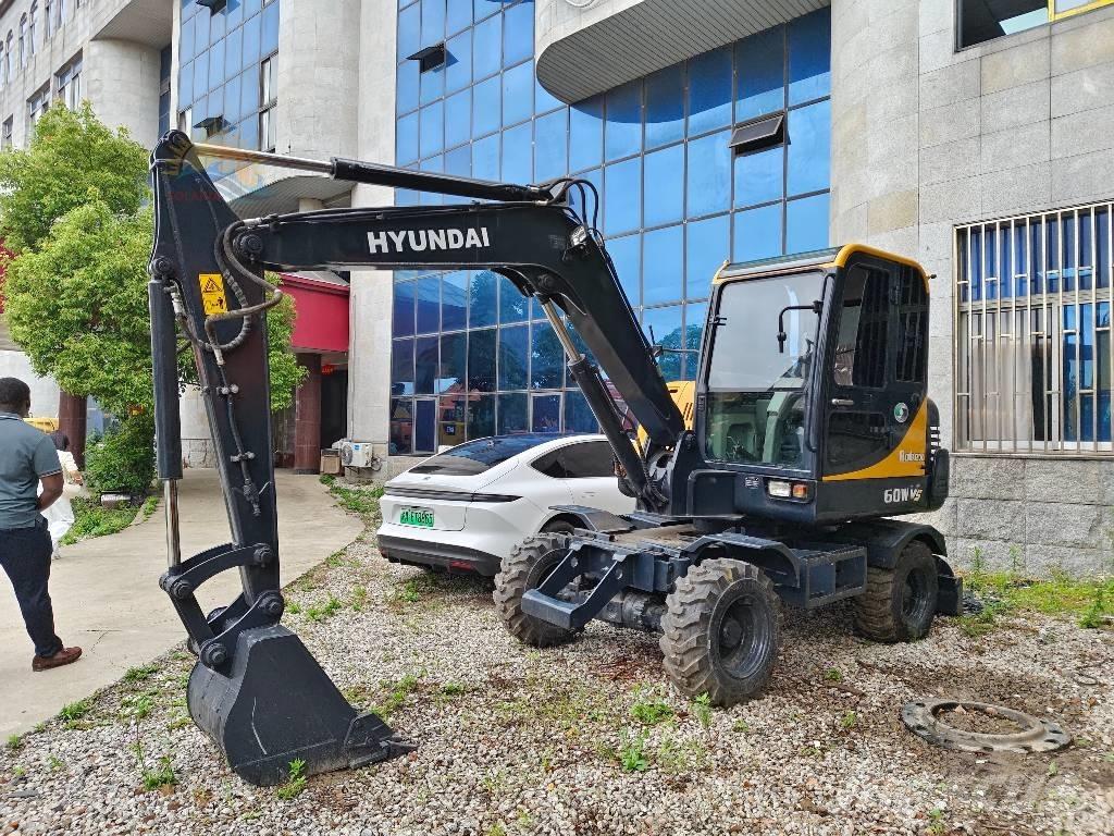 CAT R60W Колёсные экскаваторы
