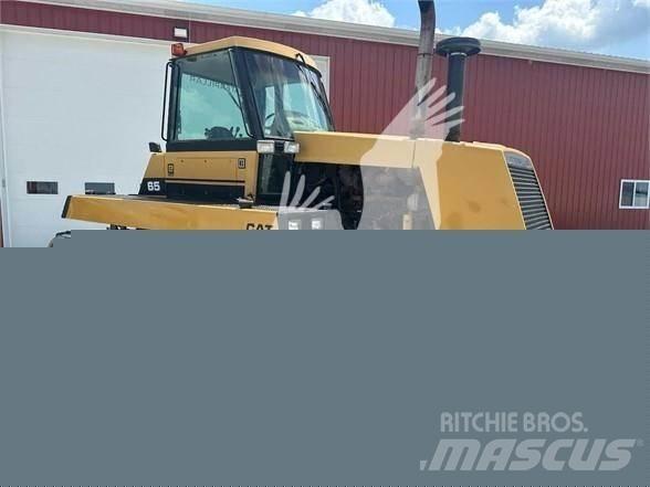 CAT CH65 Трактора