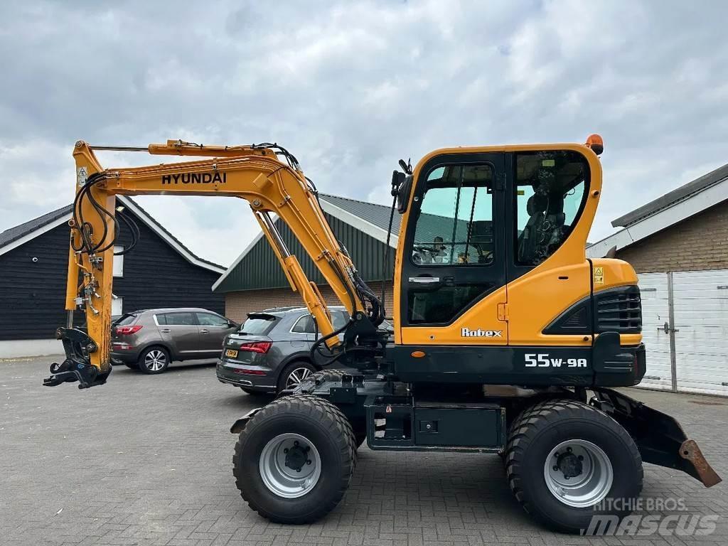Hyundai 55W-9A Колёсные экскаваторы