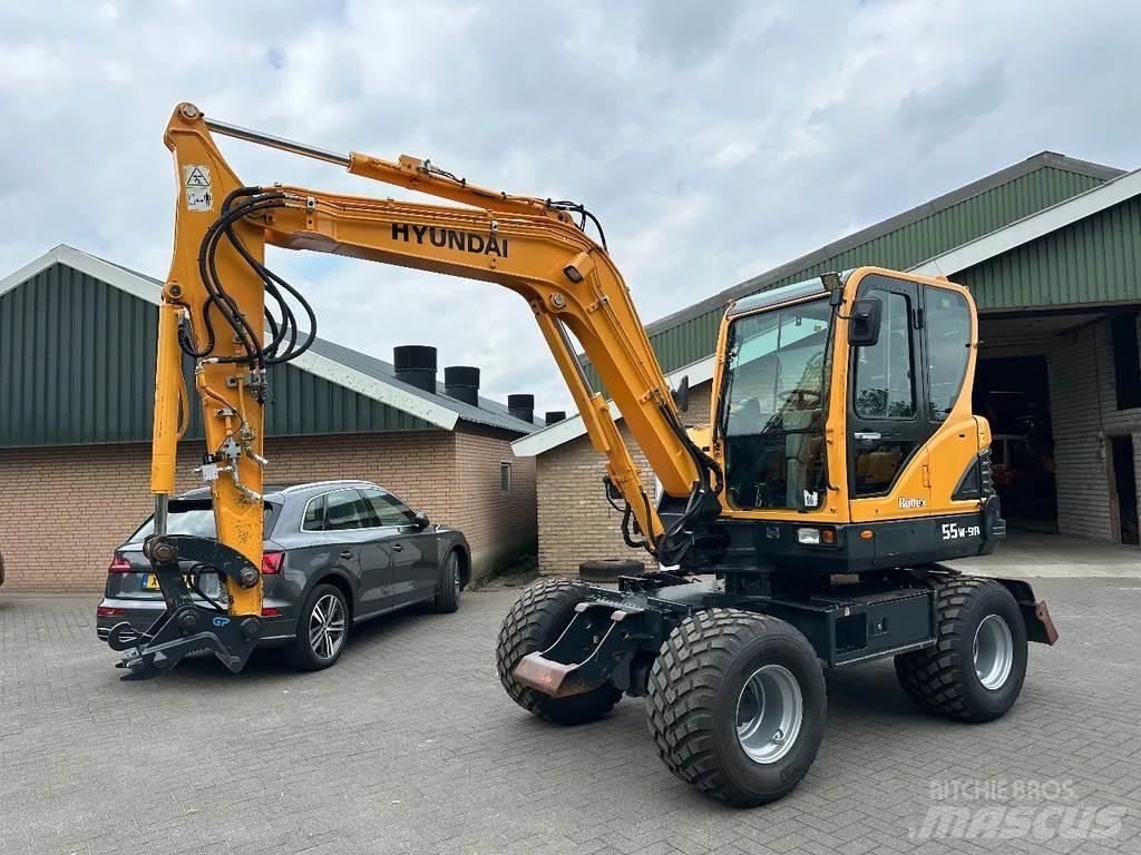 Hyundai 55W-9A Колёсные экскаваторы