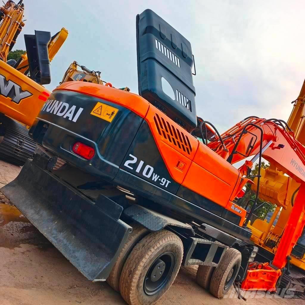 Hyundai 210W-9 Колёсные экскаваторы