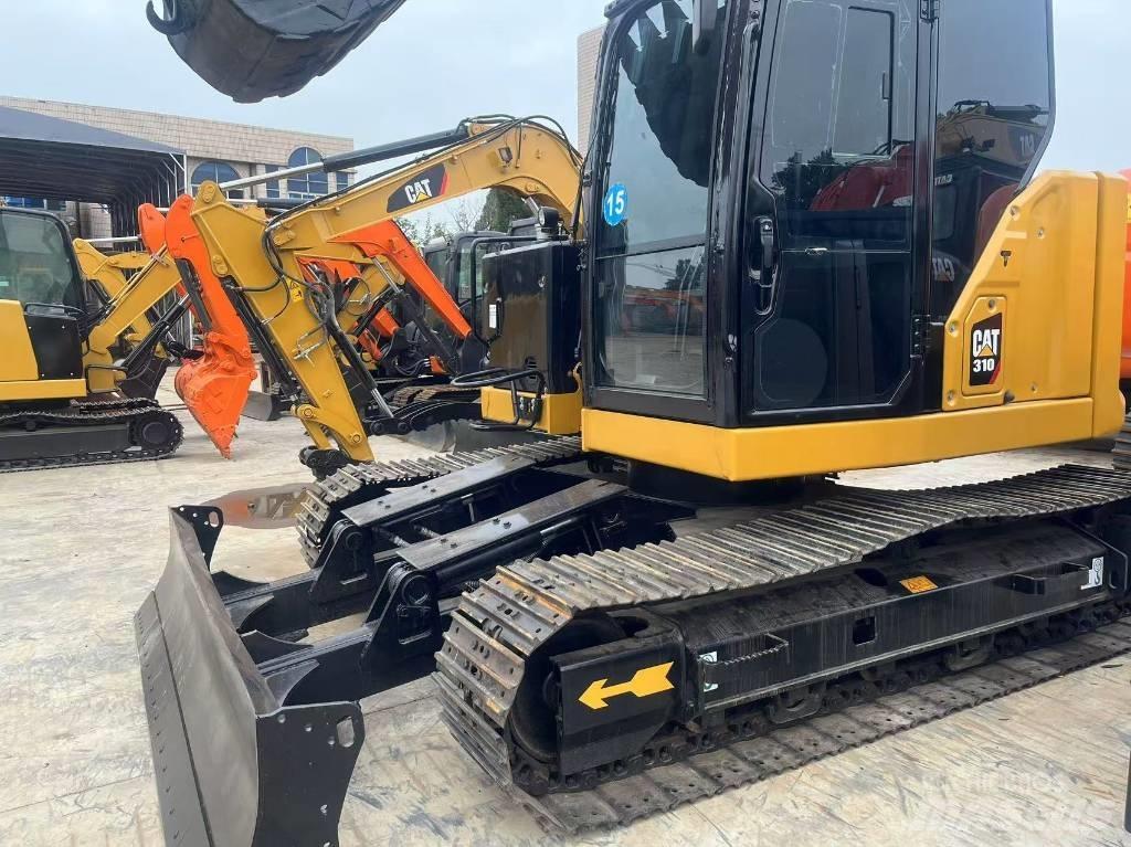 CAT 310 Гусеничные экскаваторы