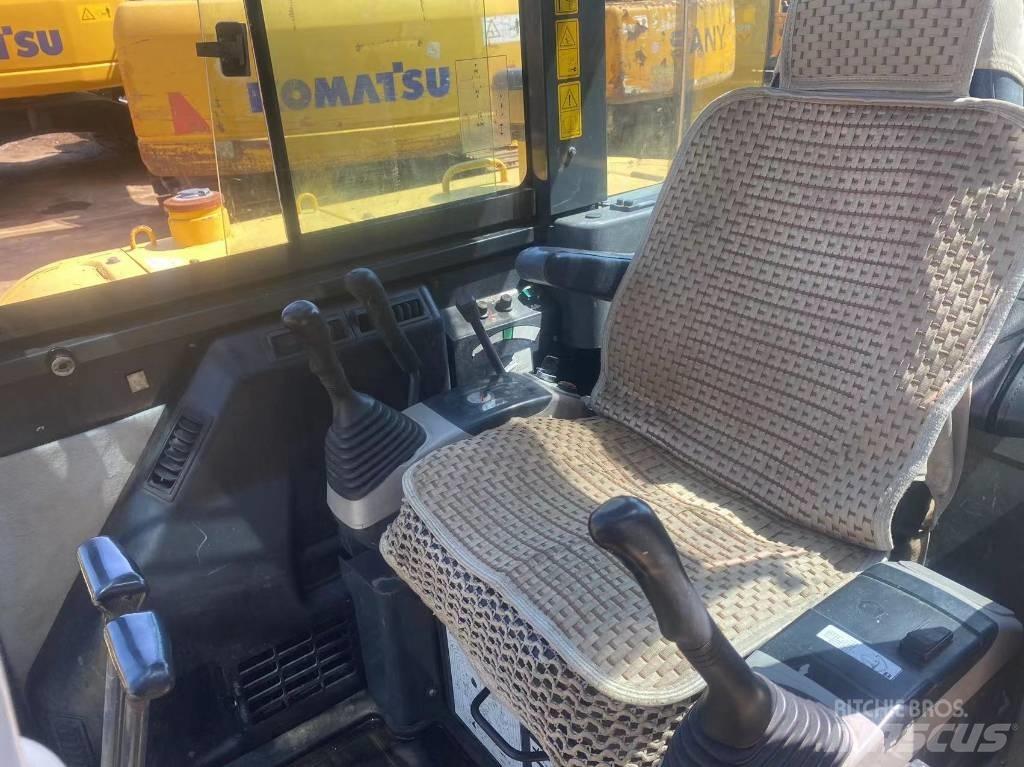 Komatsu PC56 Гусеничные экскаваторы
