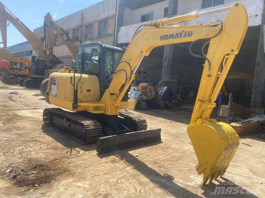 Komatsu PC56 Гусеничные экскаваторы