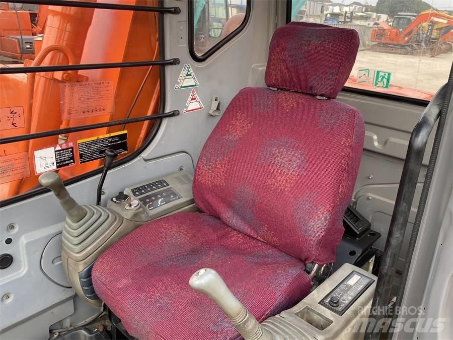 Hitachi EX60 Гусеничные экскаваторы