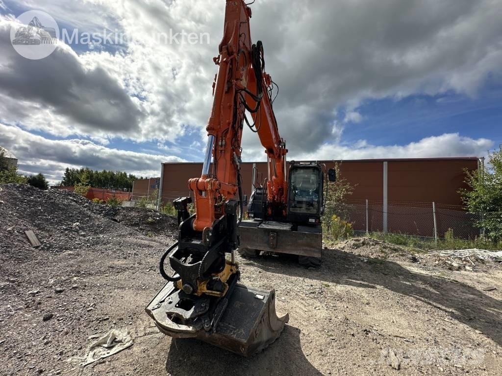 Hitachi ZX 140 W-5B Колёсные экскаваторы