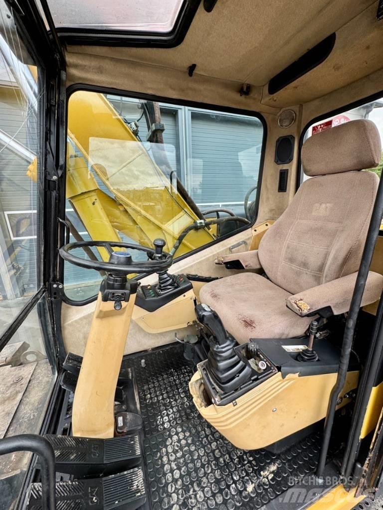 CAT M 315 Колёсные экскаваторы