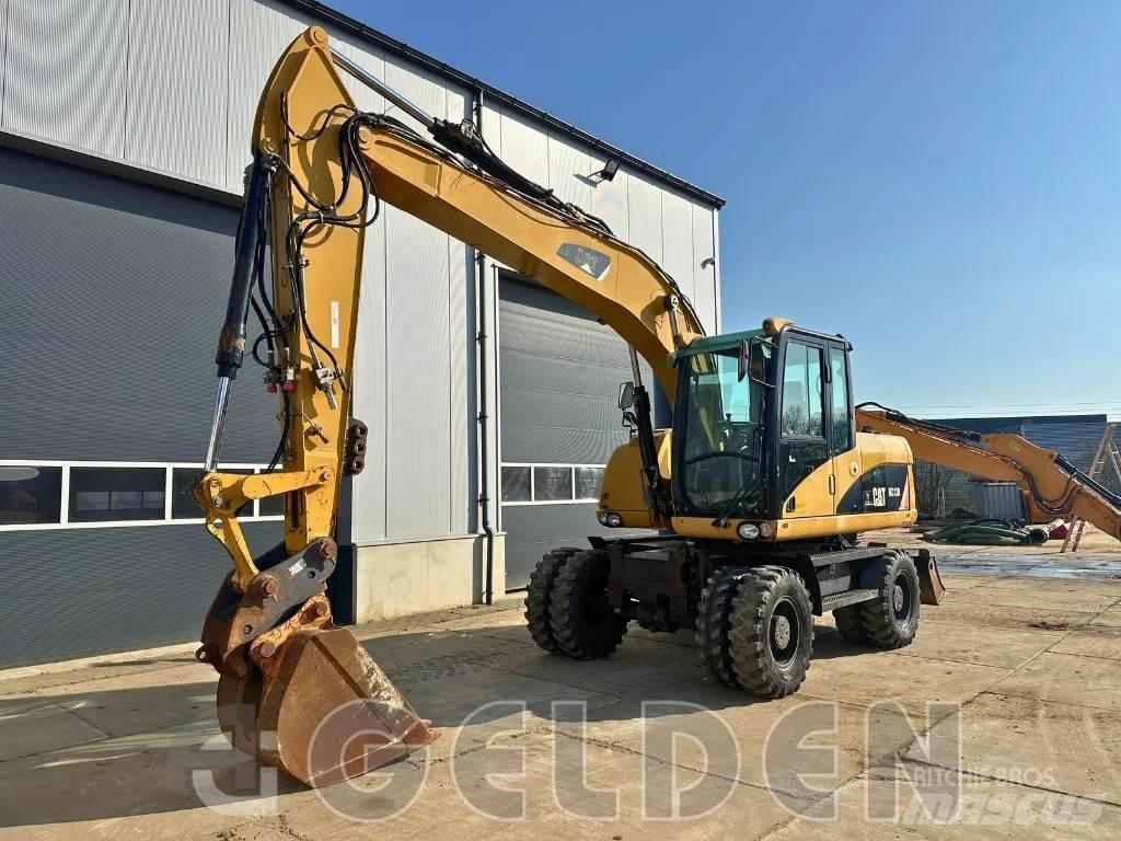 CAT M313D Колёсные экскаваторы
