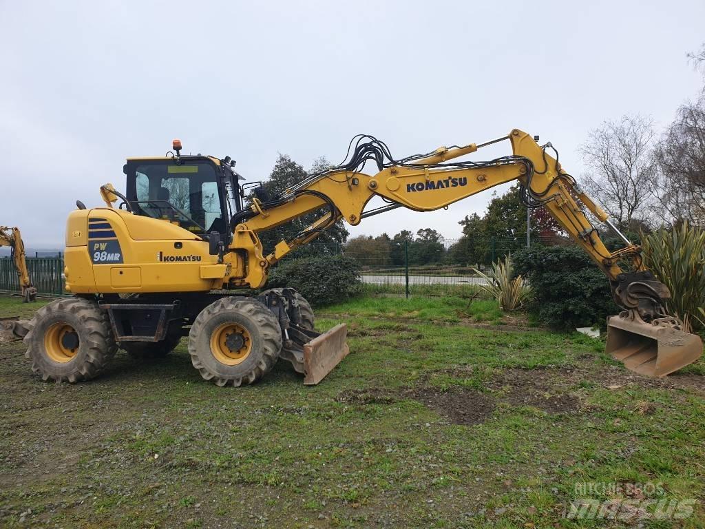 Komatsu PW98MR-10 Колёсные экскаваторы