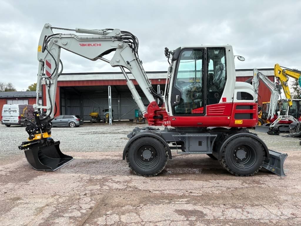Takeuchi TB395W Колёсные экскаваторы