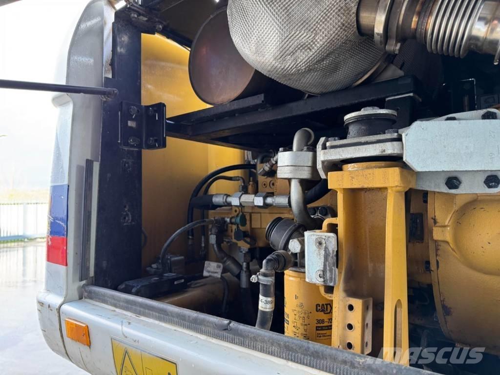 CAT M315D Колёсные экскаваторы