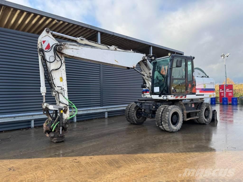 CAT M315D Колёсные экскаваторы