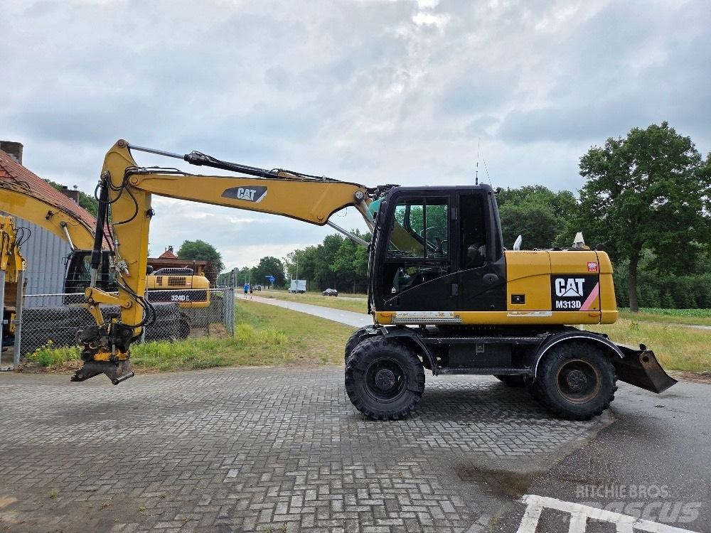CAT M313D Колёсные экскаваторы