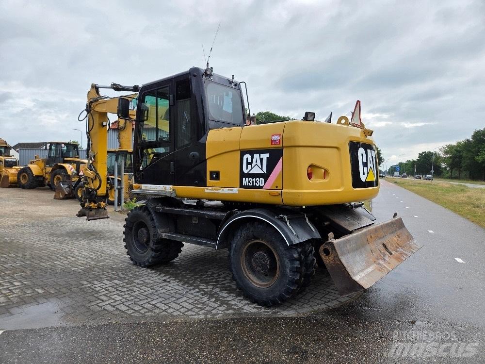 CAT M313D Колёсные экскаваторы
