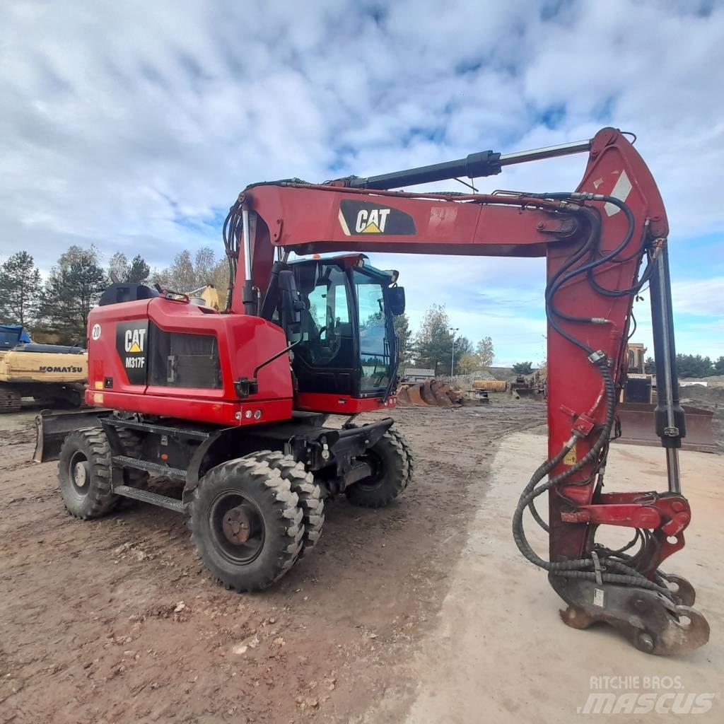 CAT M317 Колёсные экскаваторы