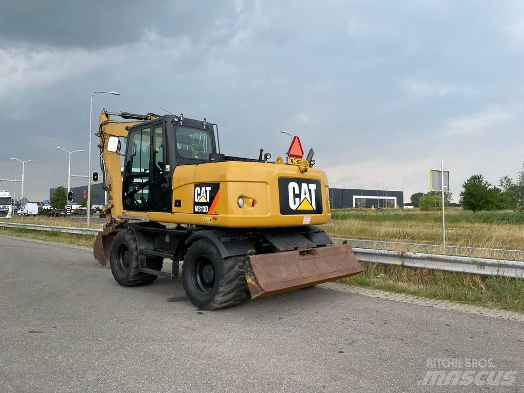 CAT M313D - CE Колёсные экскаваторы