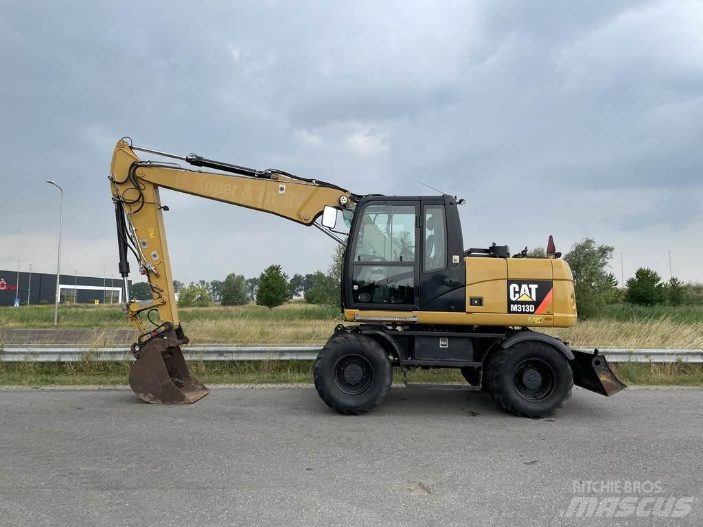 CAT M313D - CE Колёсные экскаваторы