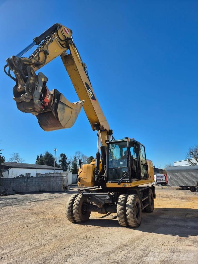 CAT M322F Колёсные экскаваторы