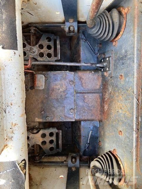 Bobcat 7753 Мини-погрузчики