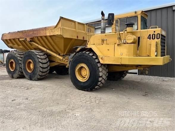 CAT D400 Шарнирно-сочленённые самосвалы