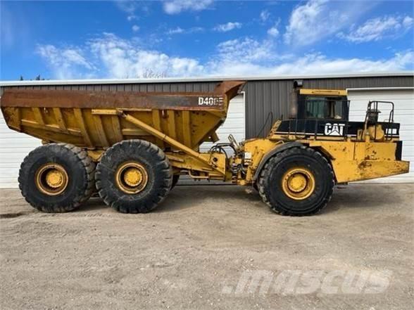 CAT D400E Шарнирно-сочленённые самосвалы