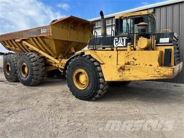 CAT D400E Шарнирно-сочленённые самосвалы