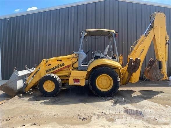 Komatsu WB140 Экскаваторы-погрузчики