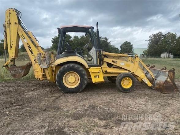 Komatsu WB140 Экскаваторы-погрузчики