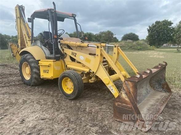 Komatsu WB140 Экскаваторы-погрузчики