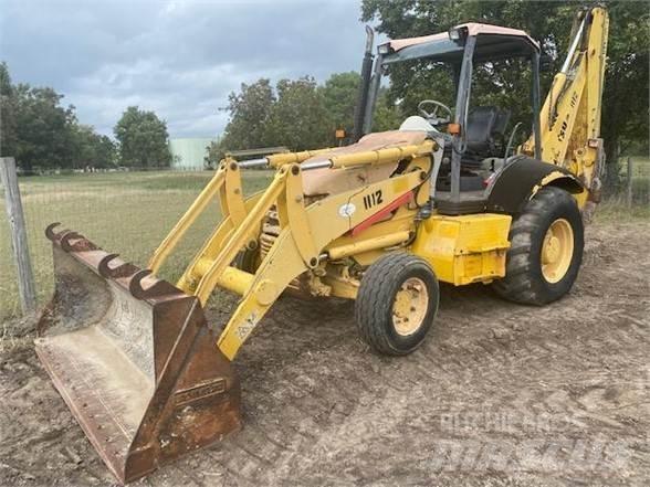 Komatsu WB140 Экскаваторы-погрузчики