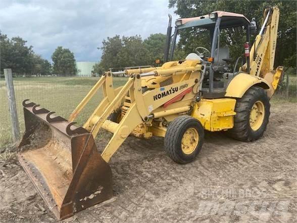 Komatsu WB140 Экскаваторы-погрузчики